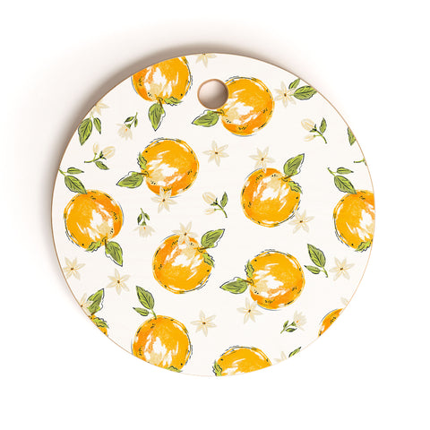 Iveta Abolina Tossed Oranges on White Cutting Board Round