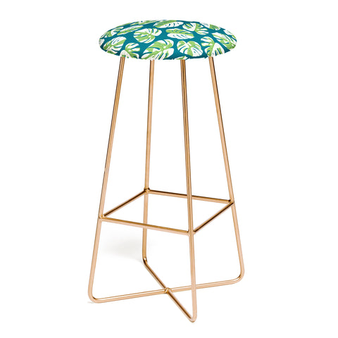 Little Arrow Design Co variegated monstera on blue Bar Stool