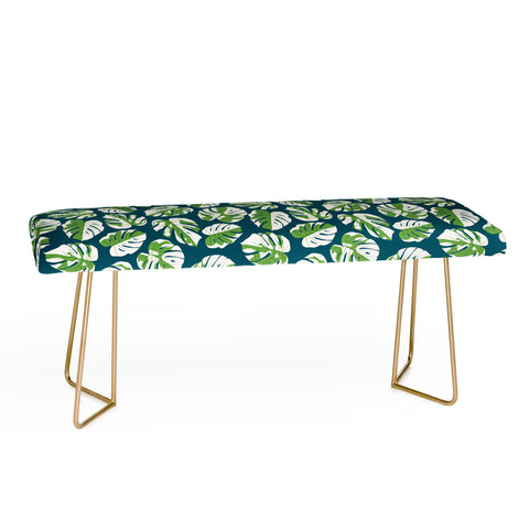 Little Arrow Design Co variegated monstera on blue Bench